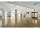A spacious community center great room, featuring high ceilings and an open floor plan at 609 Deerwood Ave, Englewood, FL 34223
