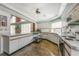 Bright and functional kitchen in the community center featuring ample counter space and modern appliances at 609 Deerwood Ave, Englewood, FL 34223