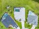 Overhead view of the home and backyard pool, showcasing the property layout and neighborhood at 7130 Scarlet Sage Ct, Punta Gorda, FL 33955