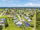 Panoramic aerial view of the residential area featuring beautiful homes, landscaping and neighborhood at 7130 Scarlet Sage Ct, Punta Gorda, FL 33955