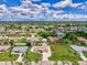 A picturesque aerial shot of a neighborhood with lush greenery and beautiful homes at 7218 Darlington St, Englewood, FL 34224