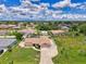 Home from above: well-kept lawn, driveway, and neighborhood setting at 7218 Darlington St, Englewood, FL 34224