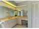 Bathroom featuring a vanity, toilet, shower, and vanity area at 7218 Darlington St, Englewood, FL 34224