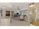 Spacious layout with a large living room flowing into the kitchen area and sunroom at 7218 Darlington St, Englewood, FL 34224