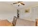 Neutral office with a ceiling fan and carpet at 7218 Darlington St, Englewood, FL 34224