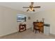 Cozy office with natural light and a ceiling fan at 7218 Darlington St, Englewood, FL 34224
