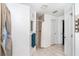 Well-lit bathroom with shower and separate toilet room, designed with neutral colors and decor at 7376 Stetson Ln, Port Charlotte, FL 33981