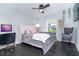 Bright bedroom with a comfortable bed, decorative touches, and modern aesthetic at 7376 Stetson Ln, Port Charlotte, FL 33981