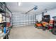 Spacious garage with ample storage space and a riding lawn mower at 7376 Stetson Ln, Port Charlotte, FL 33981