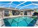 Spacious pool area with outdoor seating and room for entertaining and relaxation at 7376 Stetson Ln, Port Charlotte, FL 33981