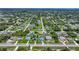 This neighborhood is a harmonious blend of residential homes and lush green spaces at 7437 Bass St, Englewood, FL 34224