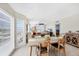 Cozy dining area with natural light and ocean views, flowing into the adjacent living space at 7486 Palm Island Dr # 2413, Boca Grande, FL 33921