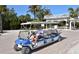 A golf cart sits ready to transport residents around the community at 7486 Palm Island Dr # 2413, Boca Grande, FL 33921