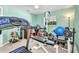 Well-equipped home gym featuring modern exercise equipment, perfect for fitness enthusiasts at 7933 Minardi St, North Port, FL 34291