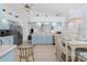 Eat-in kitchen features stainless steel appliances, ample counter space, and a light-filled dining area, perfect for Gathering meals at 926 Boundary Blvd, Rotonda West, FL 33947