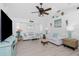 Bright and airy living room with beach themed decor, creating a relaxing and inviting space for entertaining guests at 926 Boundary Blvd, Rotonda West, FL 33947