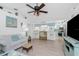 Open-concept living room showcasing a bright kitchen and cozy seating area, ideal for modern living and relaxation at 926 Boundary Blvd, Rotonda West, FL 33947