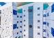 Close-up of the outdoor shower highlighting blue and white tile design and shower fixtures at 926 Boundary Blvd, Rotonda West, FL 33947