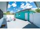 Backyard featuring a patio, seating area, and exterior view of the home at 9457 Heartwellville Ave, Englewood, FL 34224