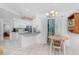 Bright dining area connects with the kitchen and the sunroom at 9457 Heartwellville Ave, Englewood, FL 34224