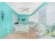 Bright sunroom with tile floors and lots of natural light at 9457 Heartwellville Ave, Englewood, FL 34224
