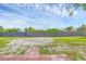 Expansive backyard with a privacy fence and ample space for outdoor activities at 10263 Waterford Ave, Englewood, FL 34224