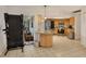 Spacious kitchen boasts granite countertops, stainless steel appliances, and ample cabinet space for all your culinary needs at 10263 Waterford Ave, Englewood, FL 34224