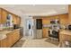 Beautiful kitchen features granite countertops, stainless steel appliances, and ample space to create culinary masterpieces at 10263 Waterford Ave, Englewood, FL 34224