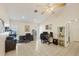 Spacious office complete with tiled floors, ample workspace, lots of natural light and ceiling fan at 10263 Waterford Ave, Englewood, FL 34224