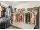 Spacious walk-in closet with ample hanging space for clothing and accessories at 10263 Waterford Ave, Englewood, FL 34224