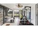 Enclosed workout area with exercise equipment and a view of the outdoors at 10263 Waterford Ave, Englewood, FL 34224
