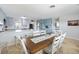 Open-concept dining area with modern finishes and plenty of seating at 1030 Haste Ln, Englewood, FL 34223