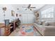 Inviting living room with neutral-toned walls and accent rug at 1030 Haste Ln, Englewood, FL 34223