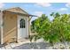 Charming outdoor shed, surrounded by landscaping at 1030 Haste Ln, Englewood, FL 34223