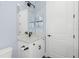Bathroom featuring modern vanity with marble countertop, sleek fixtures, and a large mirror at 11044 Hogan Cir, Englewood, FL 34223