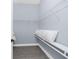 Spacious walk-in closet with wire shelving and gray wood-look flooring providing ample storage at 11044 Hogan Cir, Englewood, FL 34223