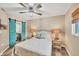 Charming bedroom with sliding doors to the bathroom and beachy decor creates a relaxed atmosphere at 1401 S Mccall Rd # 205, Englewood, FL 34223