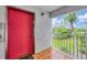 Condo building elevator with view of lush grounds at 1401 S Mccall Rd # 205, Englewood, FL 34223
