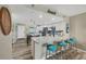 Open kitchen featuring updated appliances and granite countertops, perfect for entertaining at 1401 S Mccall Rd # 205, Englewood, FL 34223