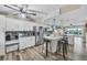 Spacious eat-in kitchen features stainless appliances and a large island with bar seating at 1401 S Mccall Rd # 205, Englewood, FL 34223