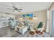 Cozy living room with beach themed decor and lots of seating at 1401 S Mccall Rd # 205, Englewood, FL 34223