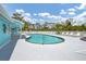 Inviting community pool with clear blue water and ample seating at 1401 S Mccall Rd # 205, Englewood, FL 34223