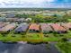 Beautiful single-story home on the lake featuring a landscaped yard and charming curb appeal at 1530 Hyssop Loop, North Port, FL 34289