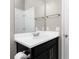 Clean bathroom featuring a vanity with modern fixtures, a large mirror, and a toilet at 1530 Hyssop Loop, North Port, FL 34289