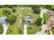 An overhead view highlights a home's solar panels, pool, extra storage, and spacious yard at 2541 Northway Dr, Venice, FL 34292