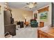 Functional bedroom with a desk, chair, and window, offering a comfortable living space with outdoor views at 2541 Northway Dr, Venice, FL 34292