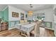 Charming dining room with a decorative chandelier and sliding doors to the outdoor patio at 2541 Northway Dr, Venice, FL 34292