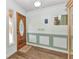 Charming foyer with wood-look flooring and decorative accents at 2541 Northway Dr, Venice, FL 34292