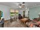 Inviting living room with wood-look floors and a cozy seating area at 2541 Northway Dr, Venice, FL 34292