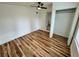 Bedroom featuring a closet, ceiling fan, and stylish wood-look flooring at 300 Dalton Blvd Blvd, Port Charlotte, FL 33952
